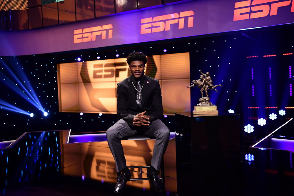Atlanta, GA - December 8, 2016 - College Football Hall of Fame: Lamar Jackson of the University of Louisville Cardinals and the Walter Camp Football Foundation Player of the Year trophy during the 2016 College Football Awards (Photo by Phil Ellsworth / ESPN Images)